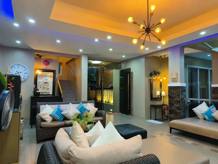 The lounge with sofas under the starburst light